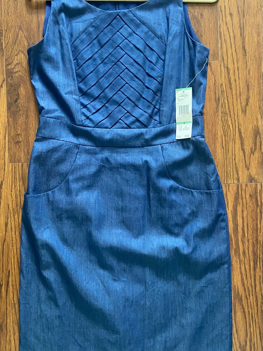 NWT Nine West Blue Sleeveless
Sheath Dress Pleated Bodice
Pockets Size 8